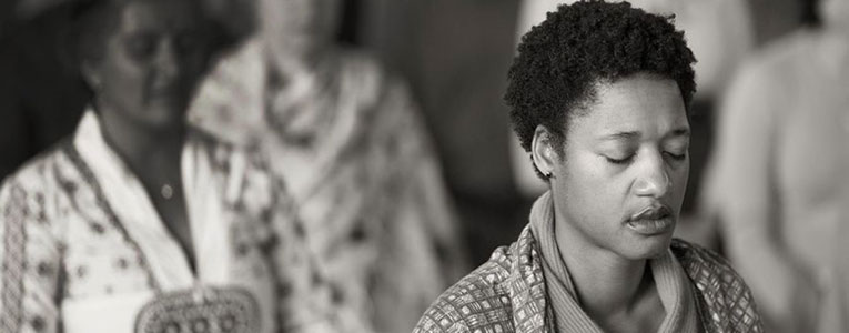 Black Woman Meditating - PeacemakerEnterprise.com - Hitaji Aziz